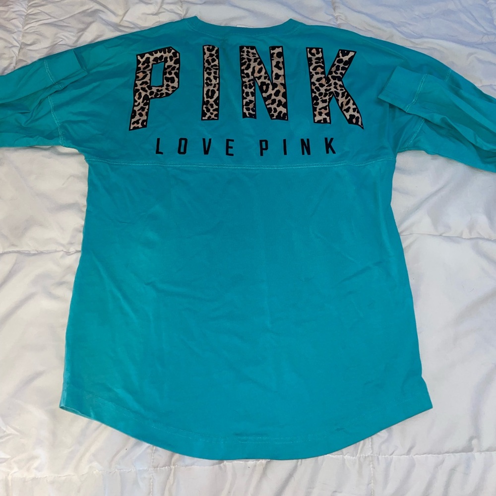 Small but fits like medium Pink long sleeve